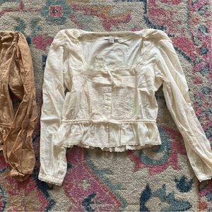 TWO  American eagle blouses medium in ivory and cinnamon